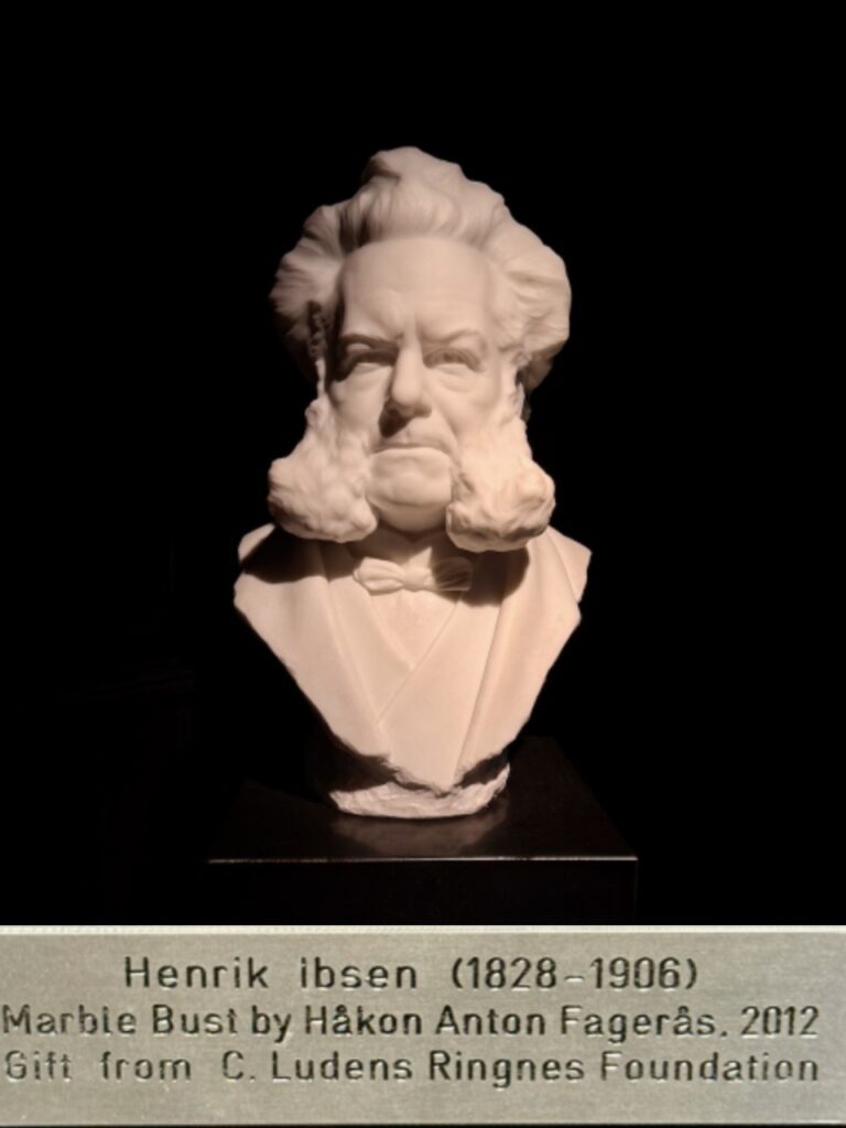 White marble bust of Ibsen with sign: "Henrik Ibsen (1828-1906) by Hakon Anton Fageras, 2012. Gift from C. Ludens Ringnes Foundation"